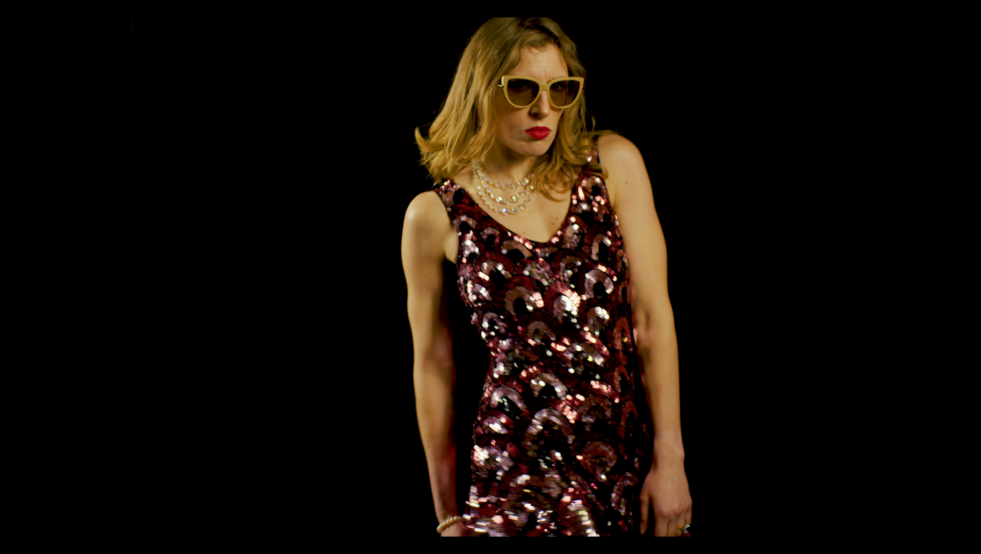 Miranda Moon wearing statement sunglasses